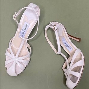 Jimmy Choo cream colored sandal-heel with caged-toe detail. Size: 36.5